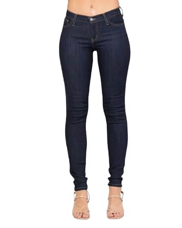 women's denim jeans for a casual FridayDark Wash Mid Rise Skinny Jeans In Dark Denim